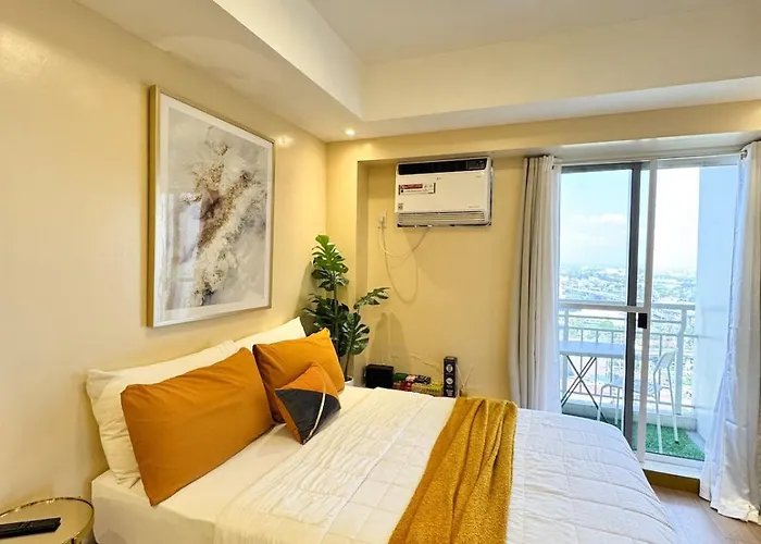 Unit With Balcony At The Celandine Qc Apartment Manila